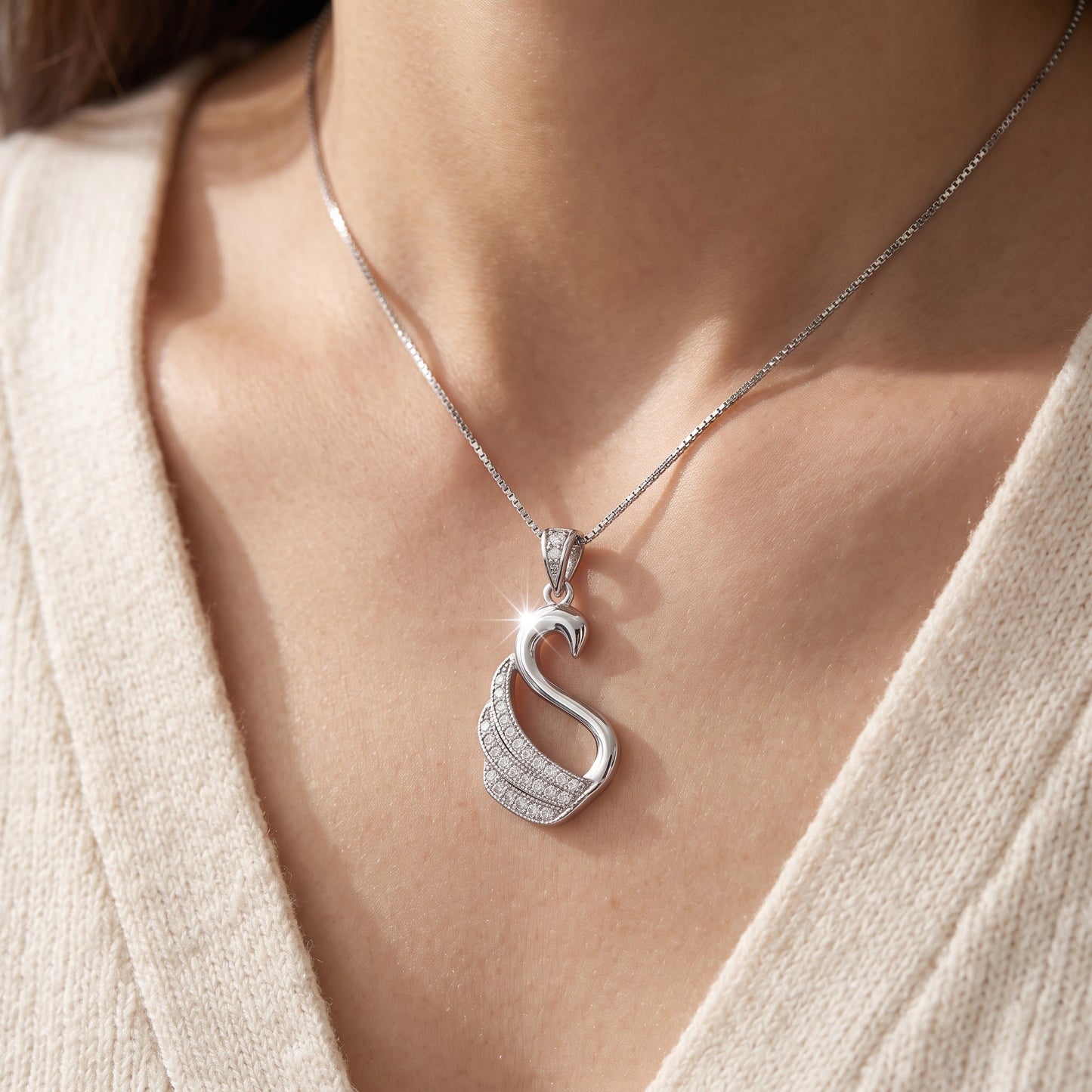 Sterling Silver Open Swan Necklace with Pave CZ Wing, 18" worn, lifestyle photo
