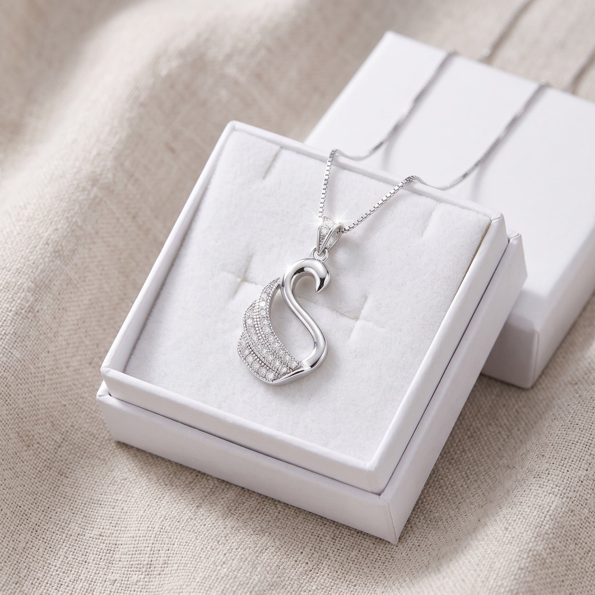 Sterling Silver Open Swan Necklace with Pave CZ Wing, 18" in a white gift box, ready to give