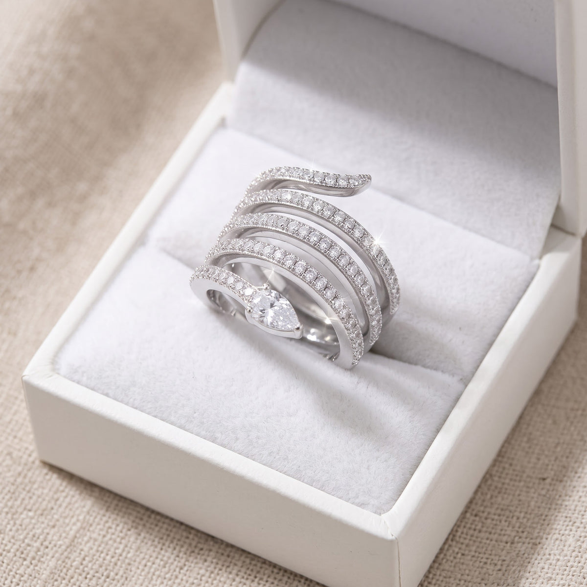 Sterling Silver CZ Wide Wrap Around Multi Row Snake Ring in a white gift box, ready to give