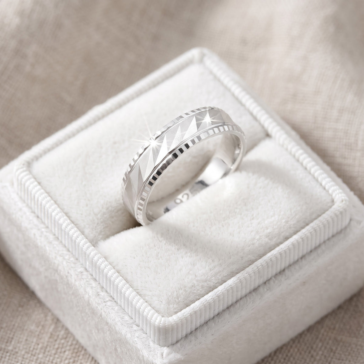 Sterling Silver Diamond Cut Wedding Band Ring in a white gift box, ready to give
