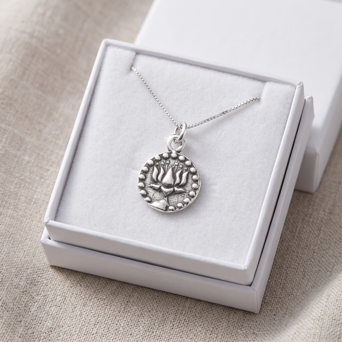 Sterling Silver Double Sided Lotus Flower & Om Symbol Necklace, 18" in a white gift box, ready to give