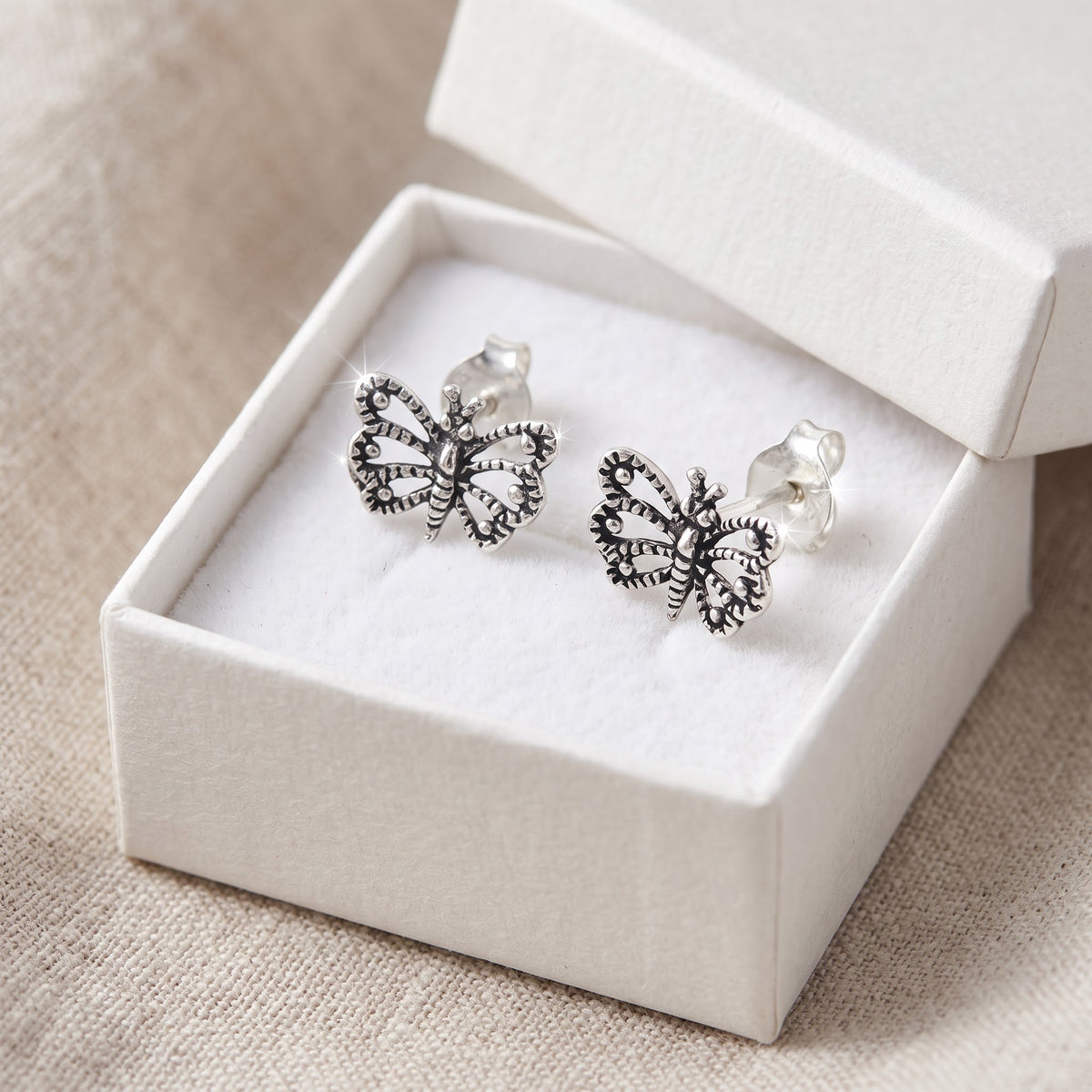 Sterling Silver Filigree Butterfly Stud Earrings, 7mm in a white gift box, ready to give
