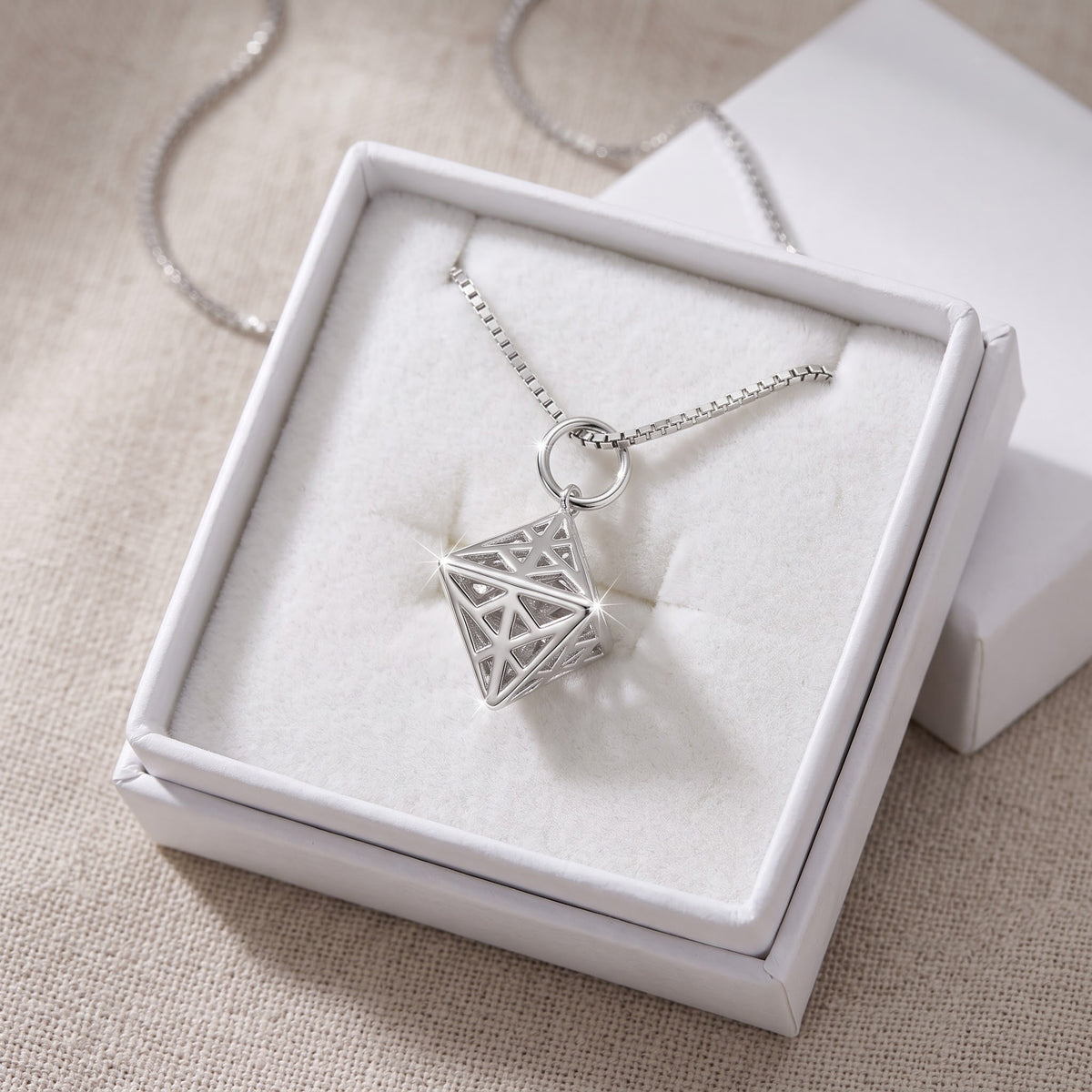 Sterling Silver Filigree Double Pyramid Necklace in a white gift box, ready to give
