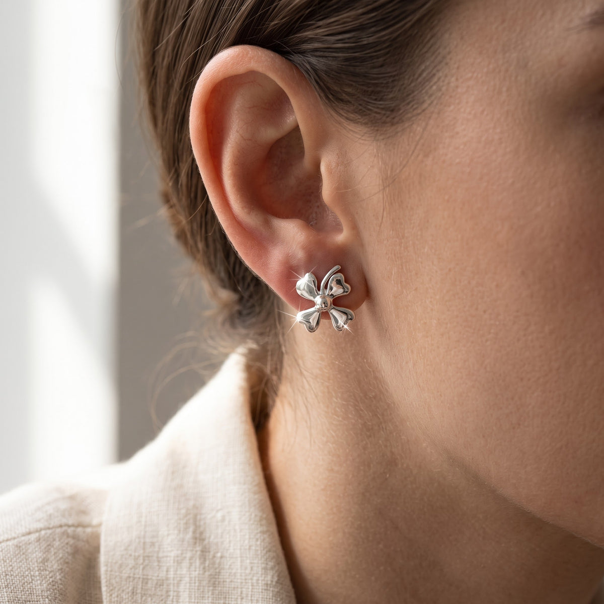 Sterling Silver Four Leaf Clover Stud Earrings - 8mm worn, lifestyle photo