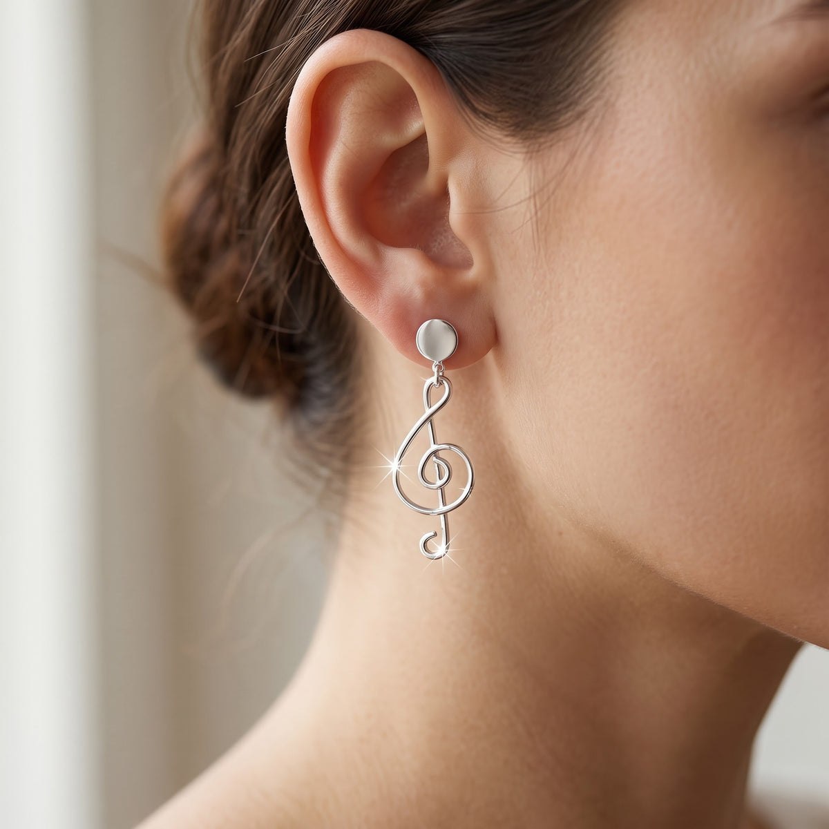 Sterling Silver G Clef Music Note Dangle Earrings worn, lifestyle photo