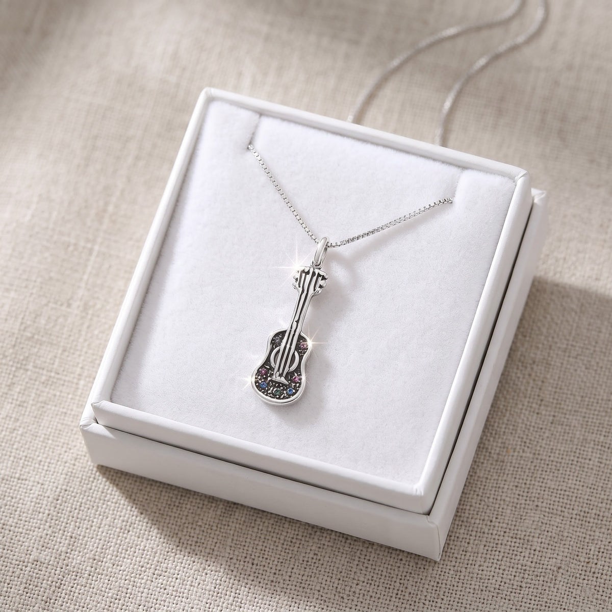Sterling Silver Guitar Necklace, 18" in a white gift box, ready to give