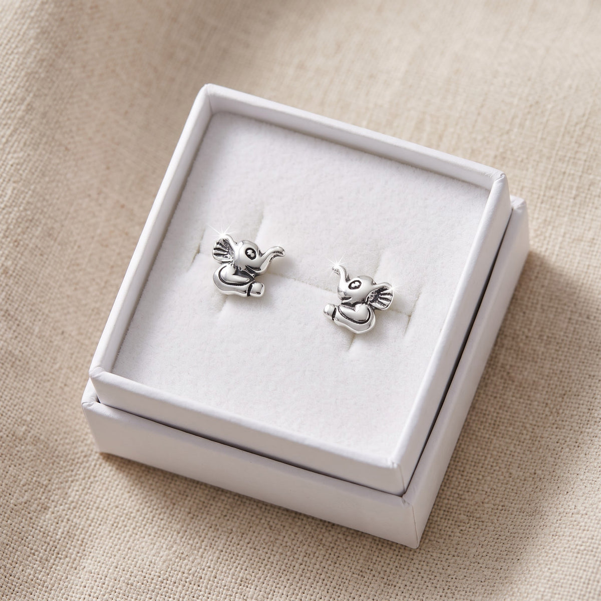 Sterling Silver Happy Elephant Stud Earrings, 6mm in a white gift box, ready to give