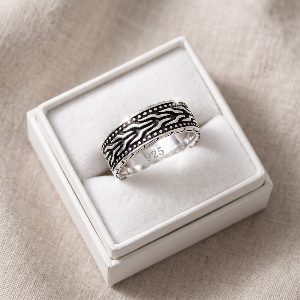 Sterling Silver Herringbone Ring in a white gift box, ready to give