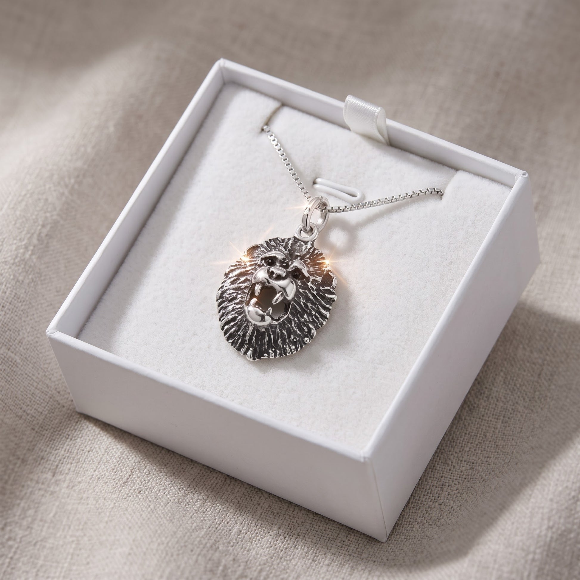 Sterling Silver Lion's Head Necklace, 18" in a white gift box, ready to give