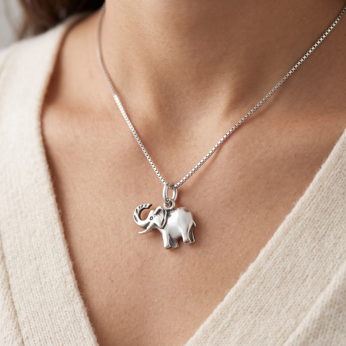Sterling Silver Lucky Elephant Necklace, 18" worn, lifestyle photo