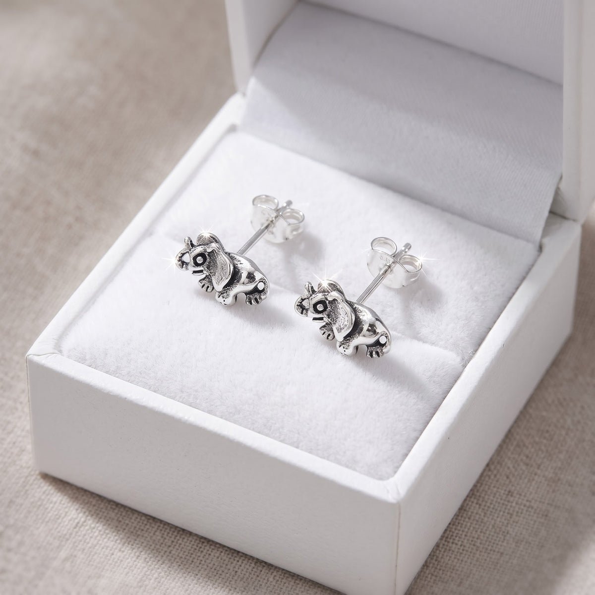 Sterling Silver Lucky Elephant Stud Earrings, 8mm in a white gift box, ready to give