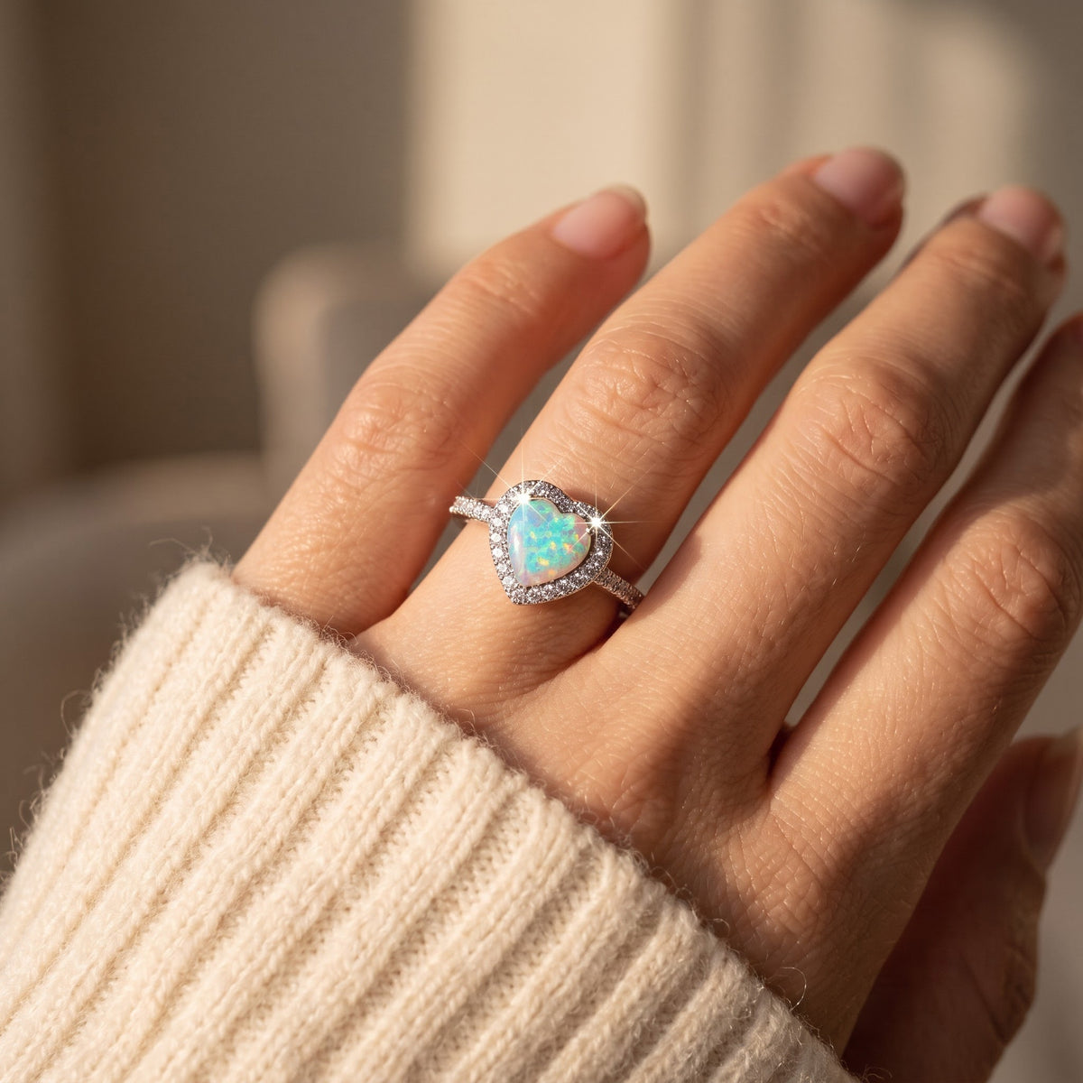 Sterling Silver Micro Pave Halo Created White Opal Heart Ring worn, lifestyle photo