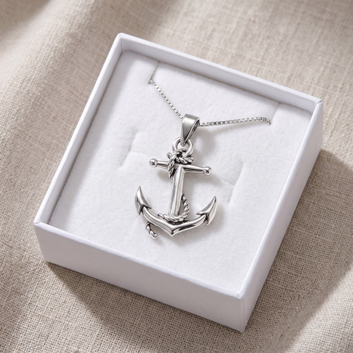 Sterling Silver Nautical Anchor Necklace in a white gift box, ready to give