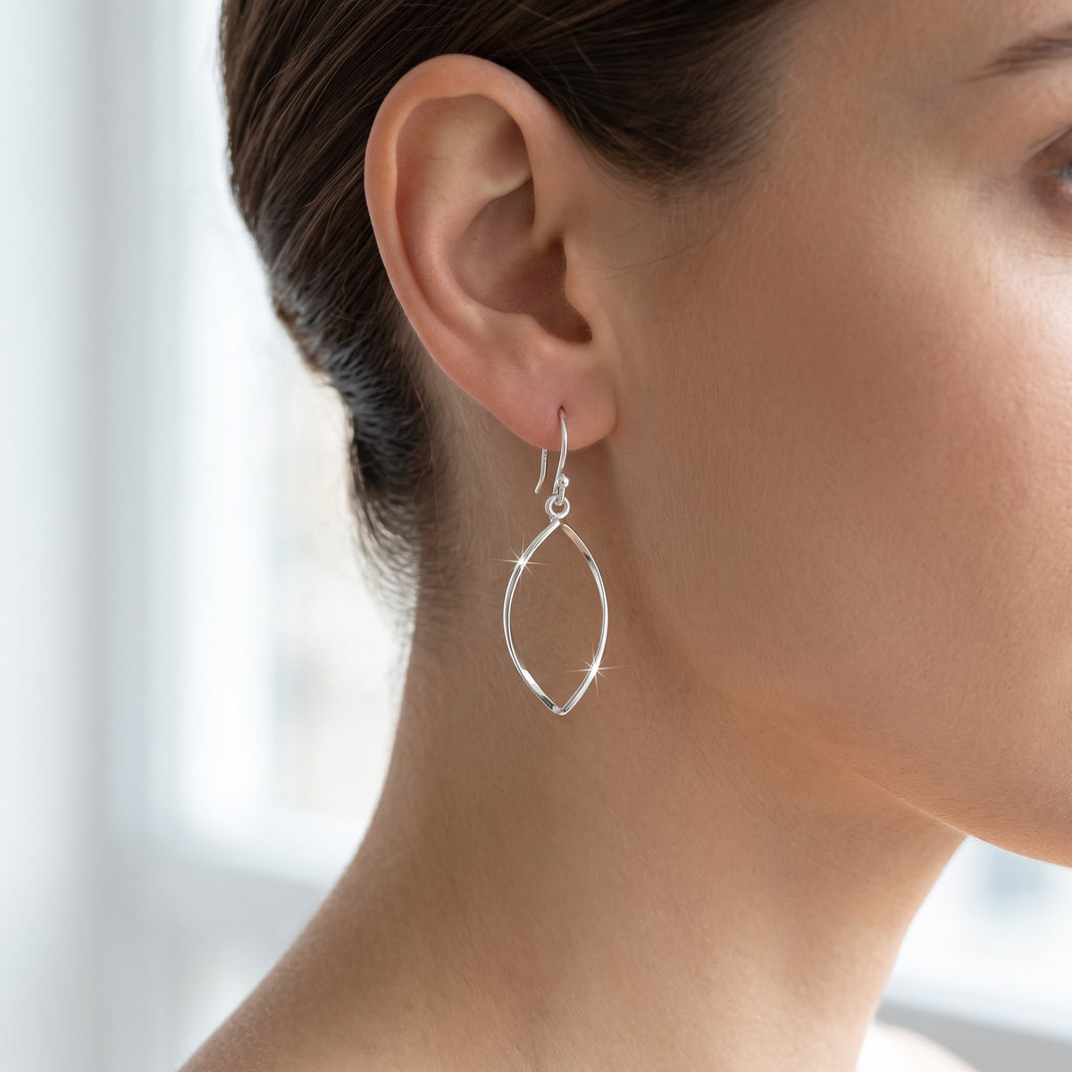 Sterling Silver Oval Drop Earrings worn, lifestyle photo