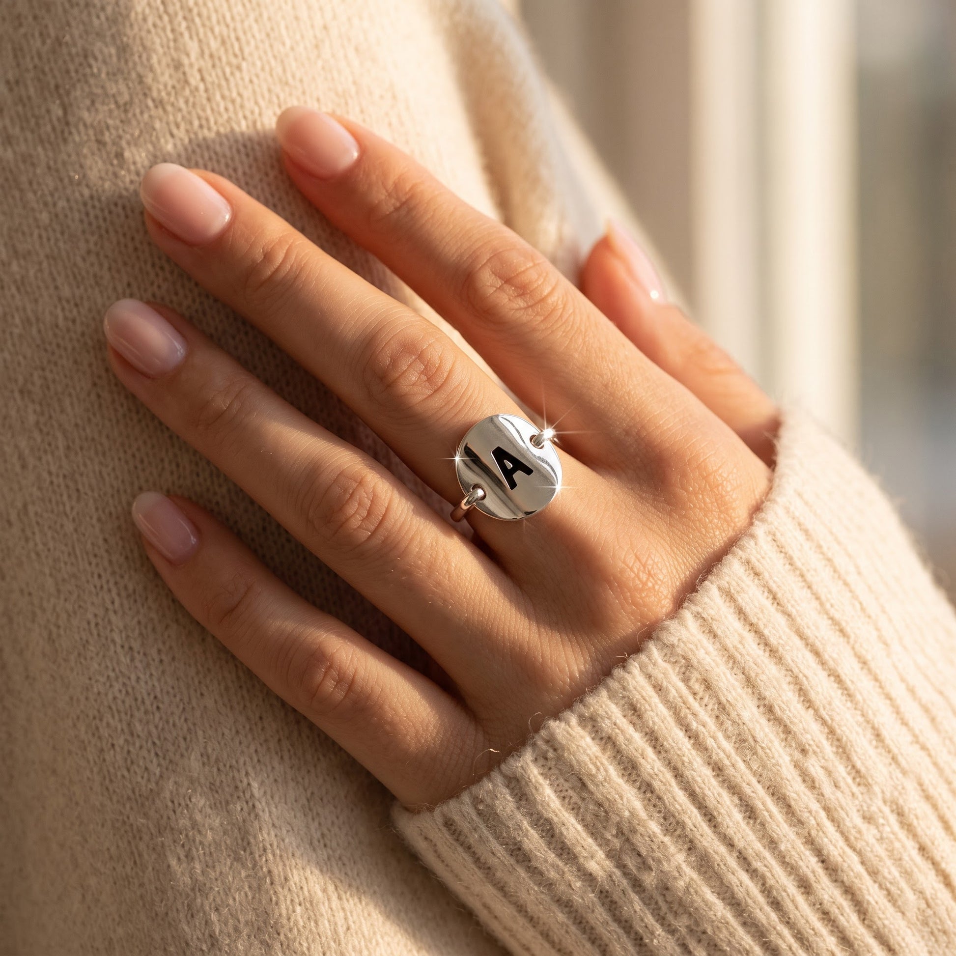 Sterling Silver Oval Initial A Ring worn, lifestyle photo