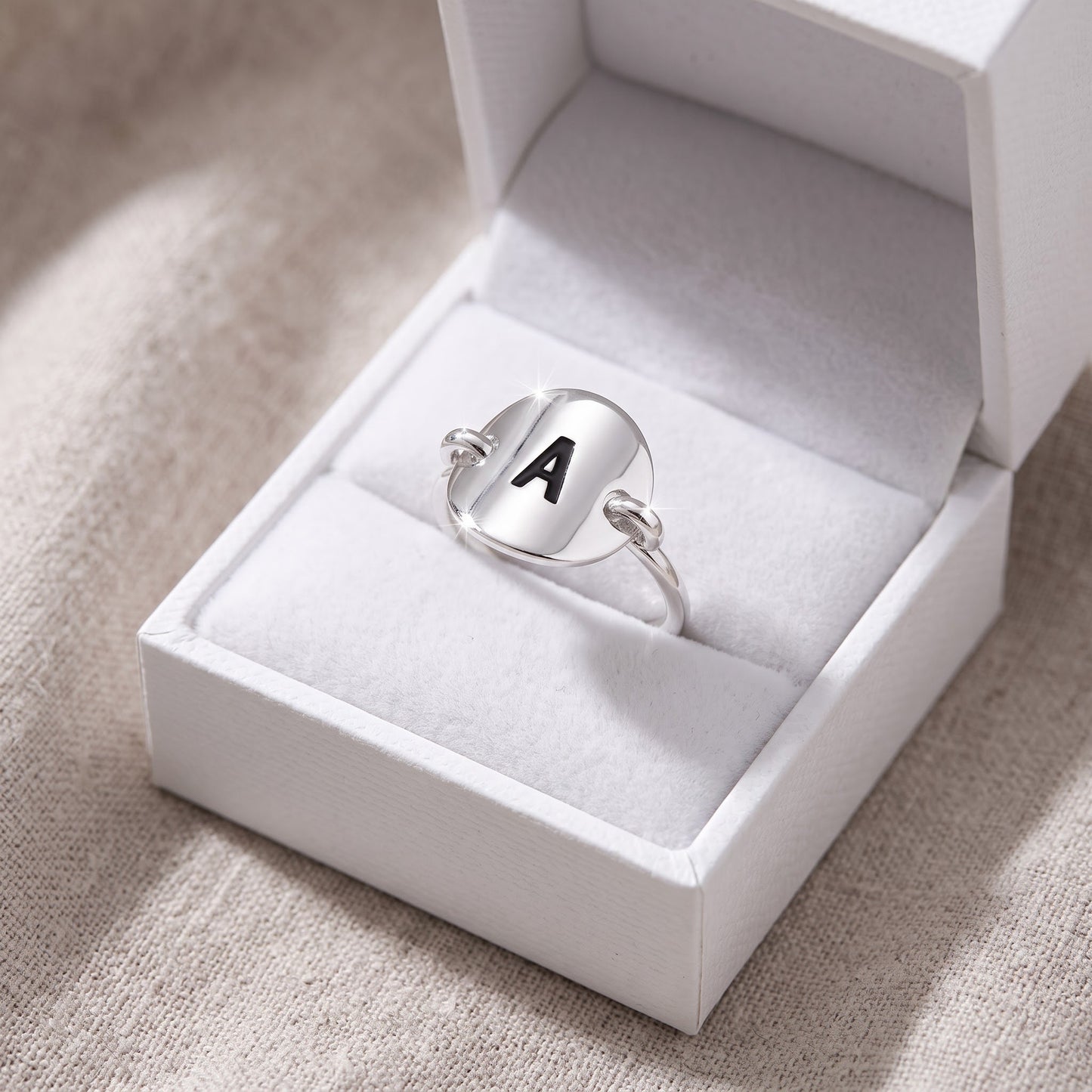 Sterling Silver Oval Initial A Ring in a white gift box, ready to give