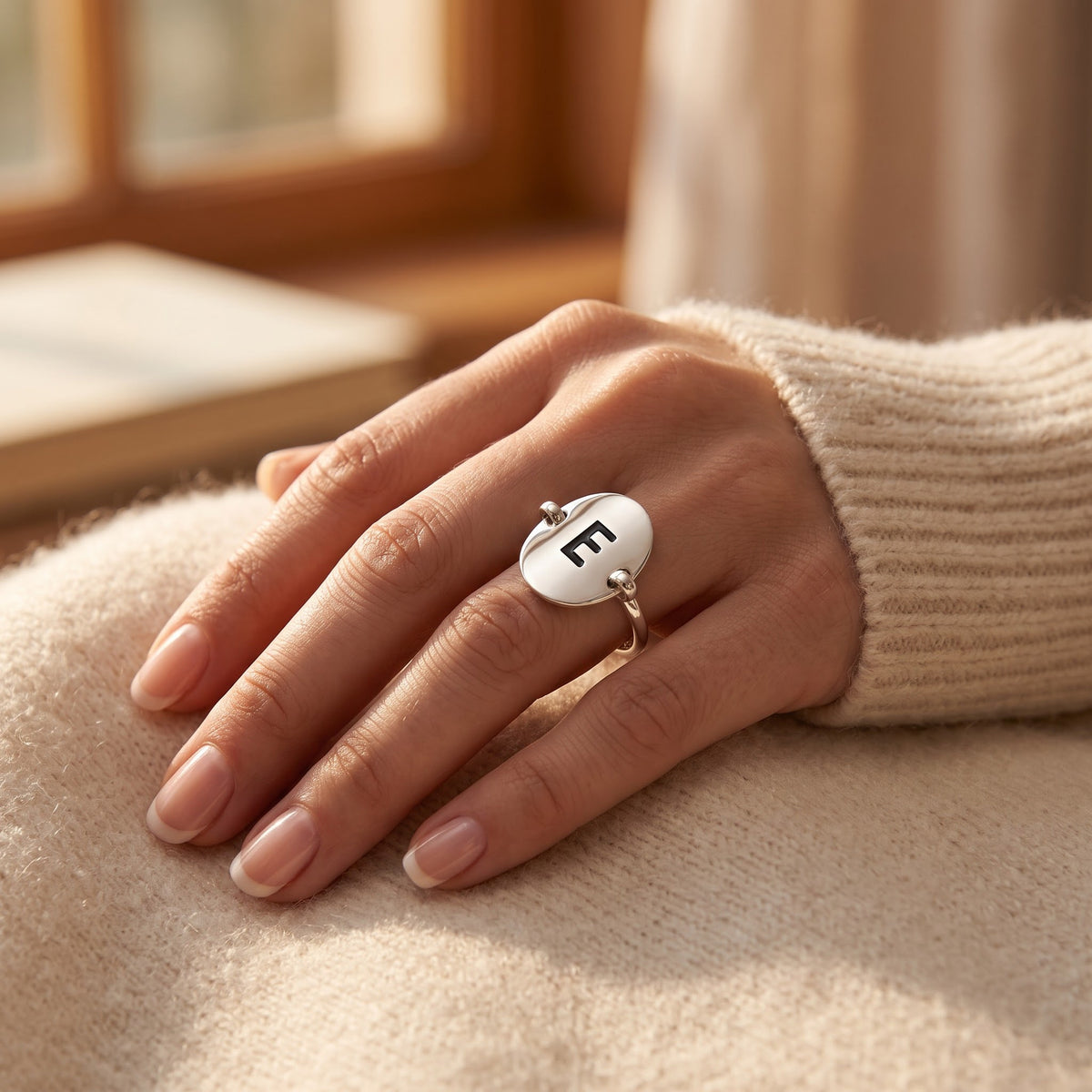 Sterling Silver Oval Initial E Ring worn, lifestyle photo