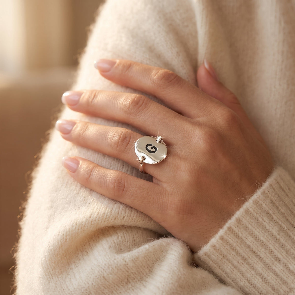Sterling Silver Oval Initial G Ring worn, lifestyle photo