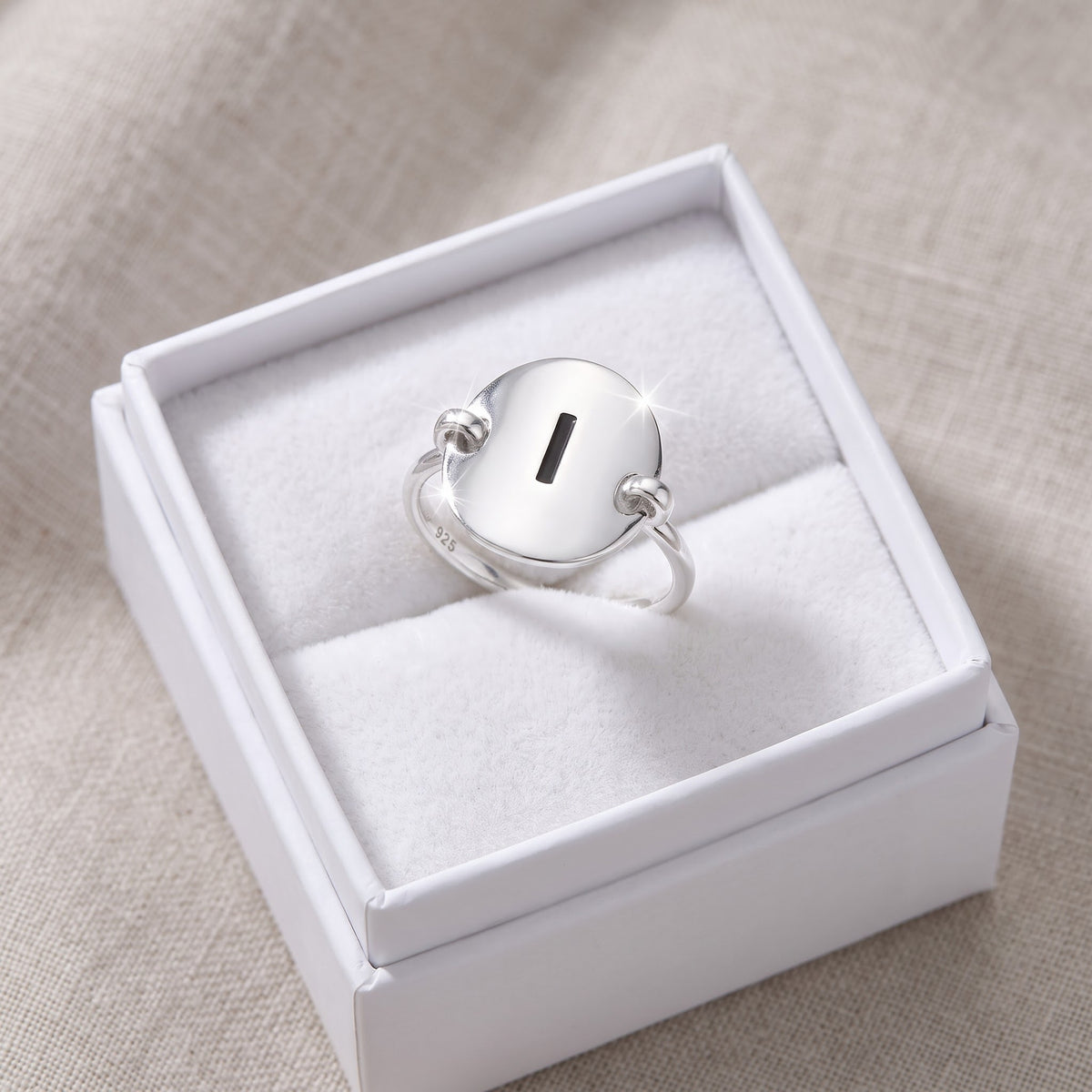 Sterling Silver Oval Initial I Ring in a white gift box, ready to give