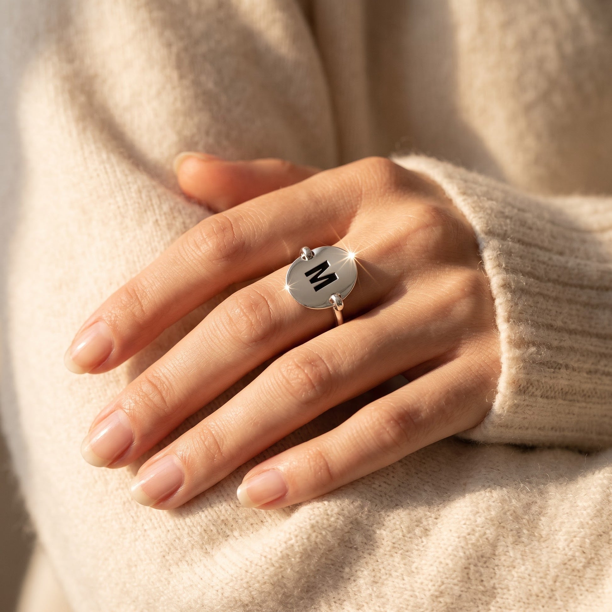 Sterling Silver Oval Initial M Ring worn, lifestyle photo