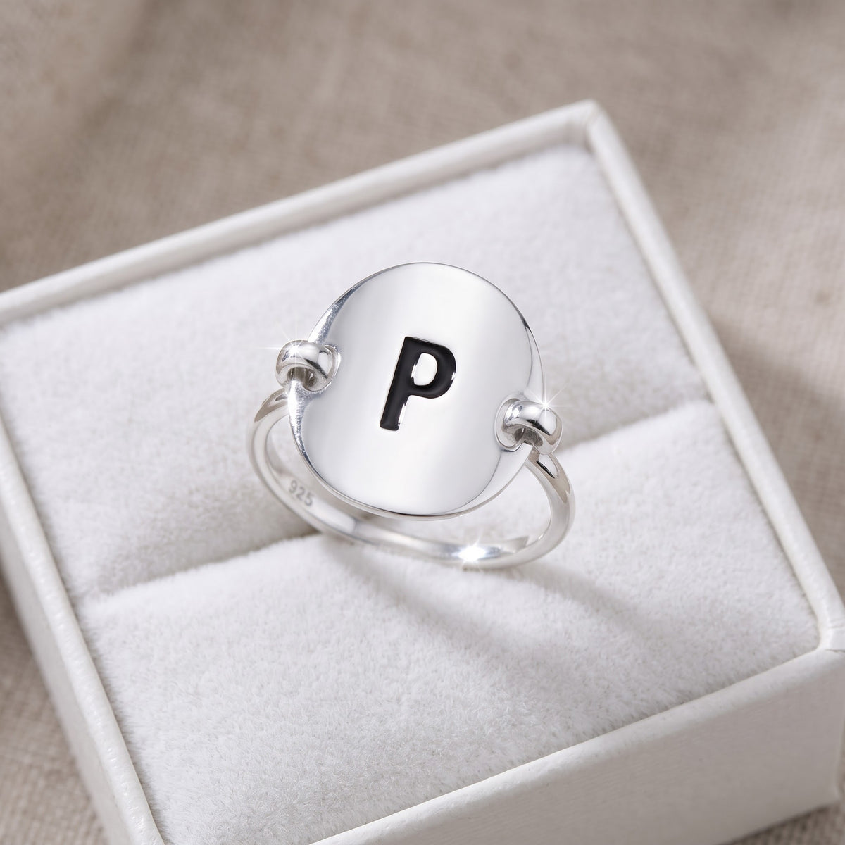 Sterling Silver Oval Initial P Ring in a white gift box, ready to give