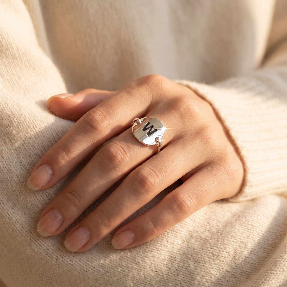 Sterling Silver Oval Initial W Ring worn, lifestyle photo