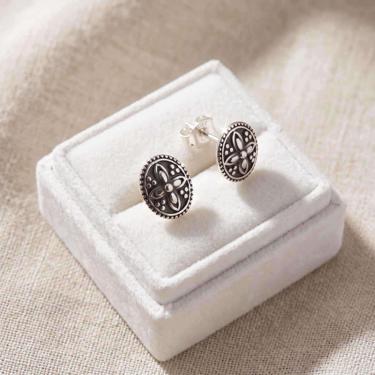 Sterling Silver Oval Oxidized Boho Filigree Stud Earrings in a white gift box, ready to give