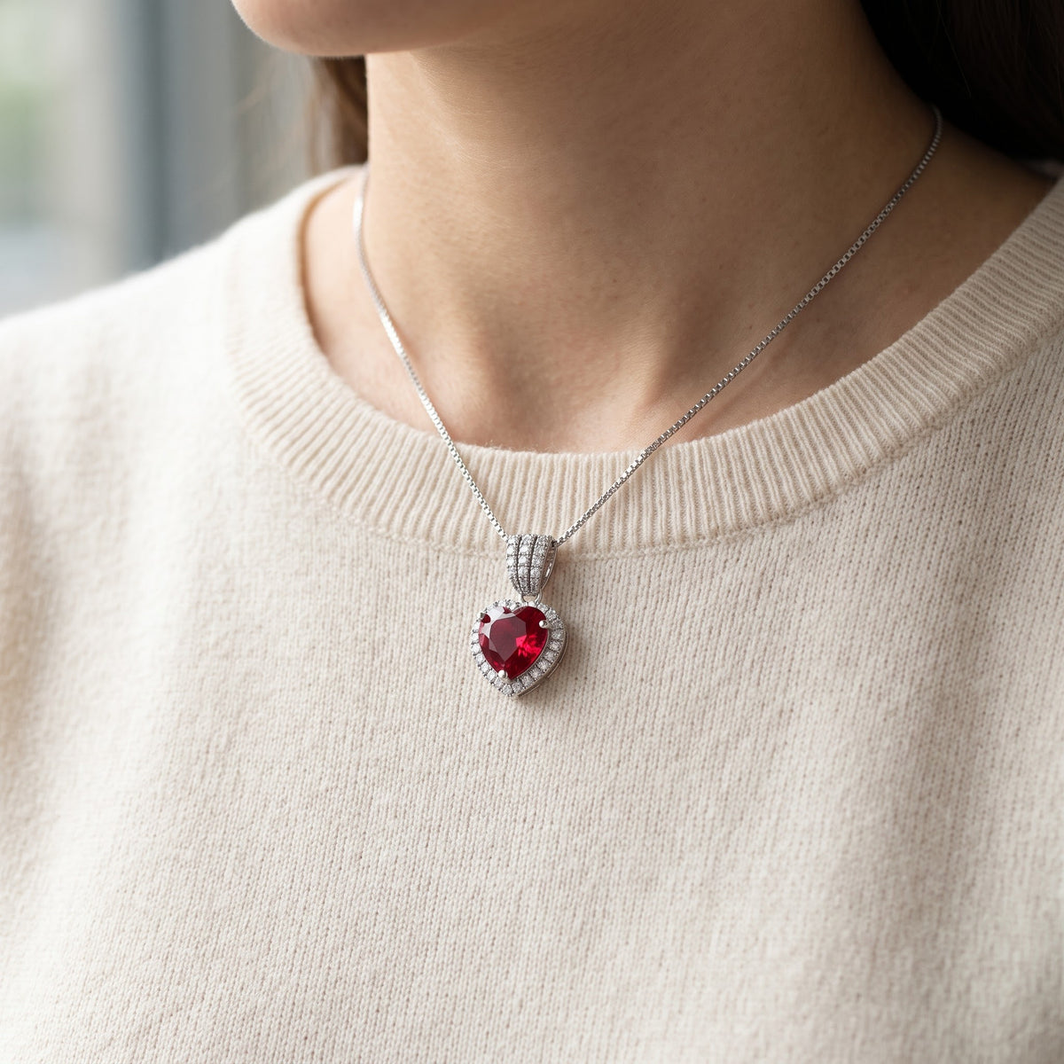 Sterling Silver Red CZ Halo Heart Necklace worn, lifestyle photo