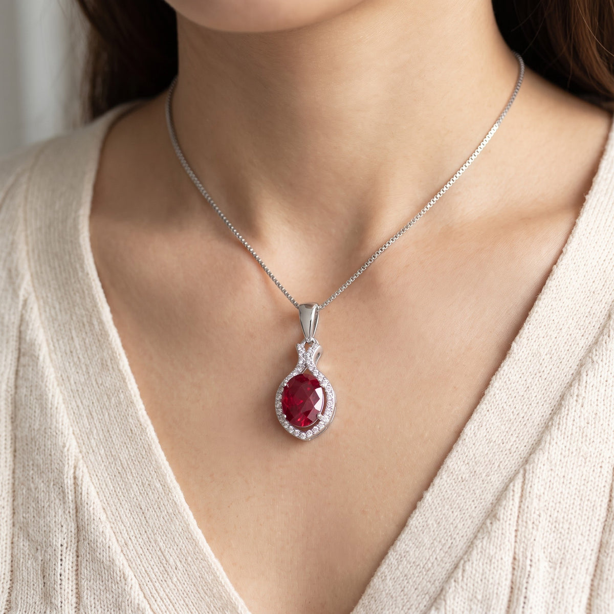 Sterling Silver Red CZ Oval Drop Necklace worn, lifestyle photo