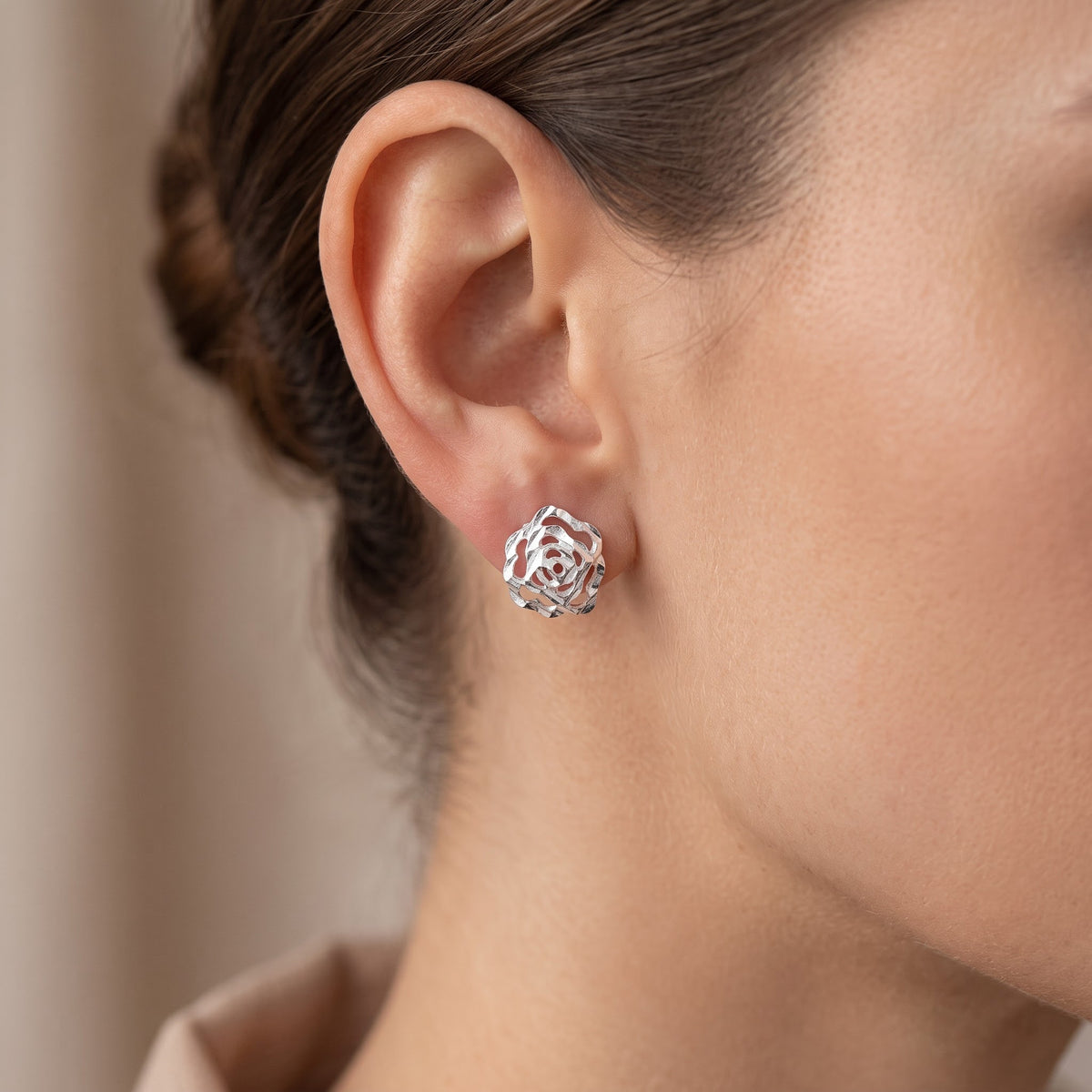 Sterling Silver Rose Flower Stud Earrings worn, lifestyle photo