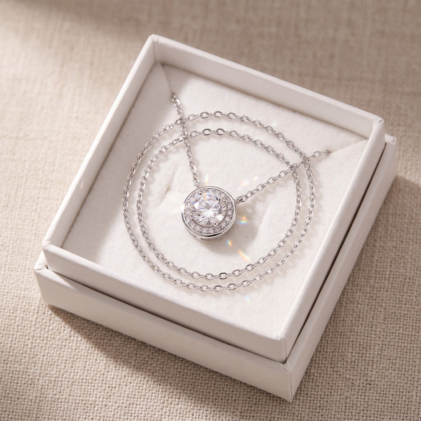Sterling Silver Round CZ Solitaire Necklace in a white gift box, ready to give