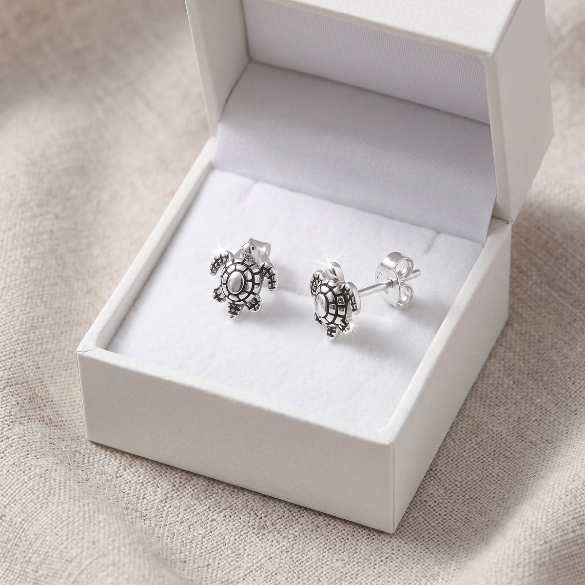 Sterling Silver Sea Turtle Stud Earrings, 8mm in a white gift box, ready to give