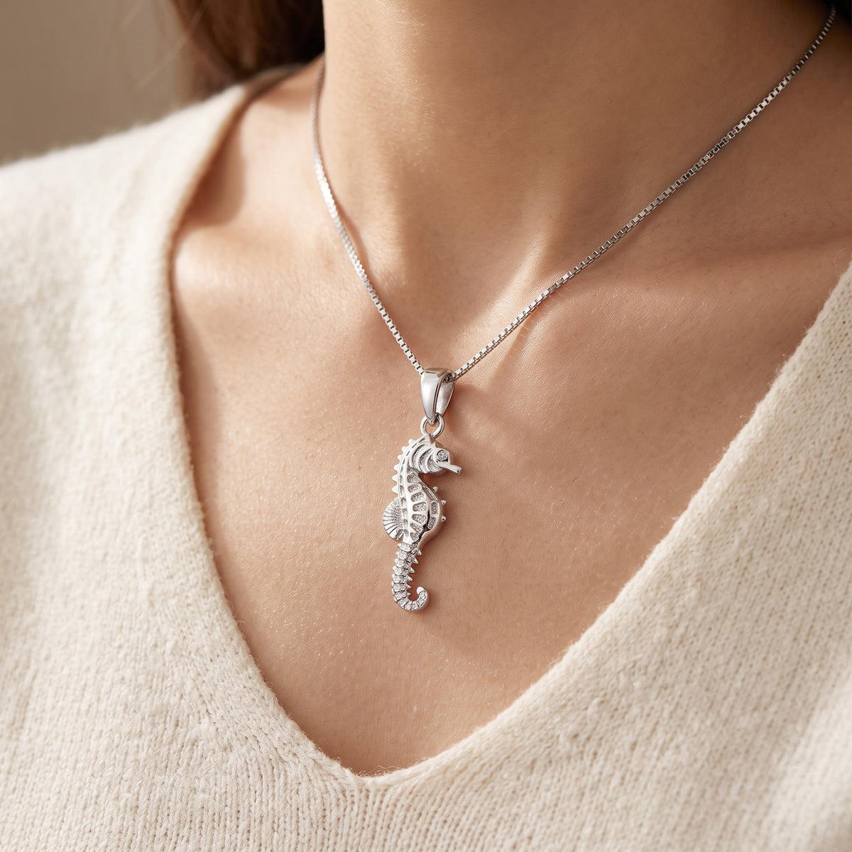 Sterling Silver Seahorse Necklace worn, lifestyle photo