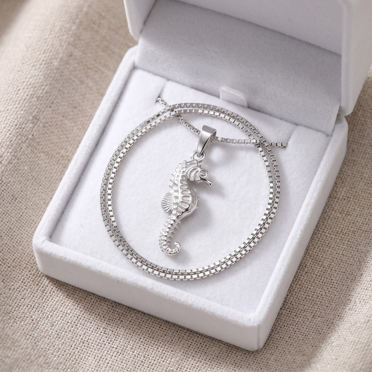 Sterling Silver Seahorse Necklace in a white gift box, ready to give