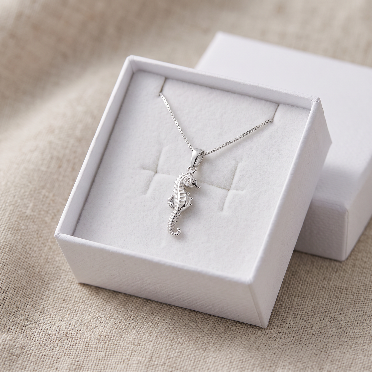 Sterling Silver Seahorse Necklace in a white gift box, ready to give