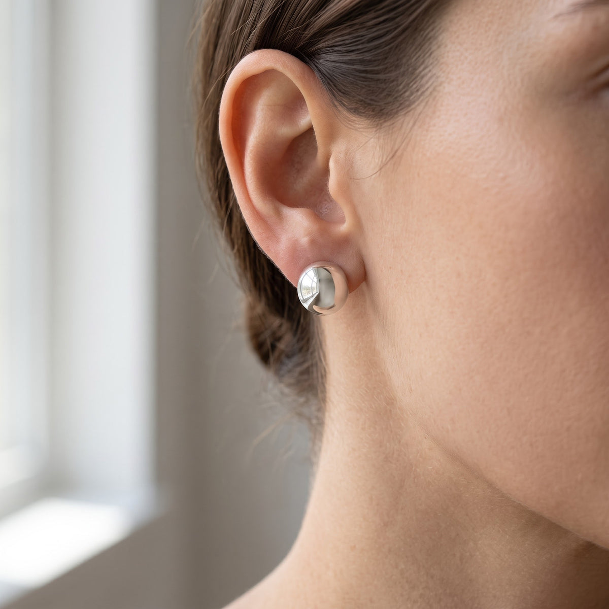 Sterling Silver Small Half Dome Stud Earrings, 8mm worn, lifestyle photo