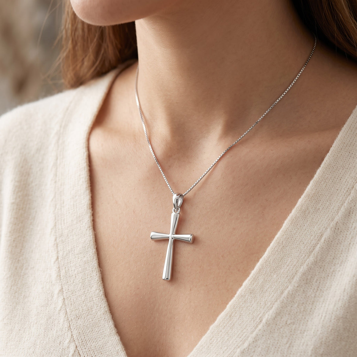 Sterling Silver Small Traditional Cross Necklace, 18 Inch Chain worn, lifestyle photo