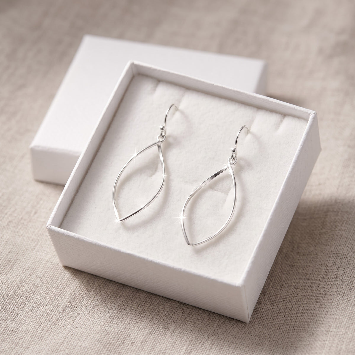 Sterling Silver Twisted Drop Earrings in a white gift box, ready to give
