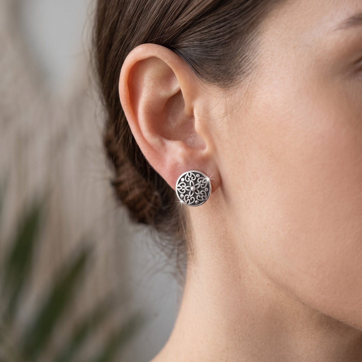 Sterling Silver Women's dainty Bali Filigree Flower Hearts Stud Earrings worn, lifestyle photo