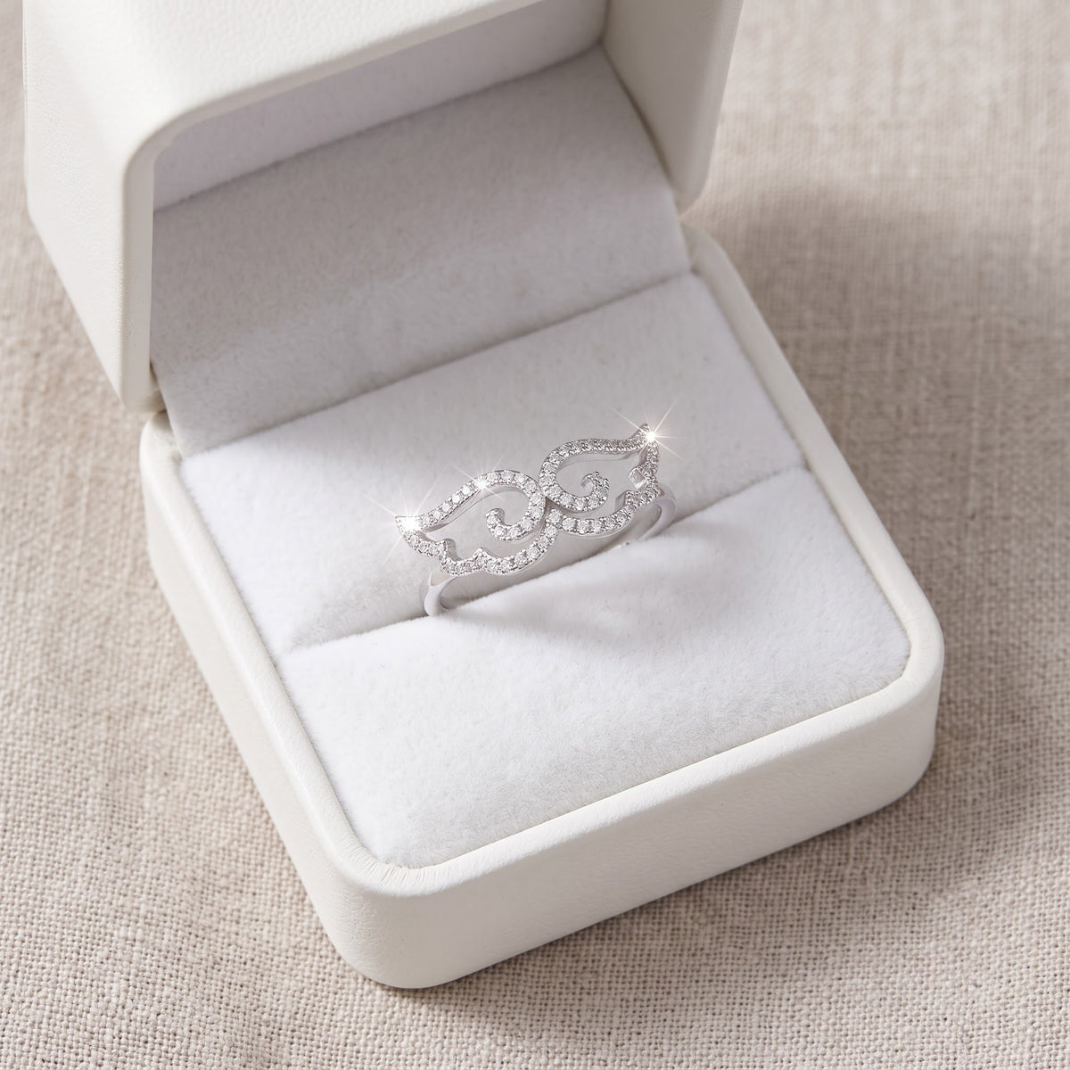 White Gold over Sterling Silver Ladies Retro CZ Moustache Ring in a white gift box, ready to give