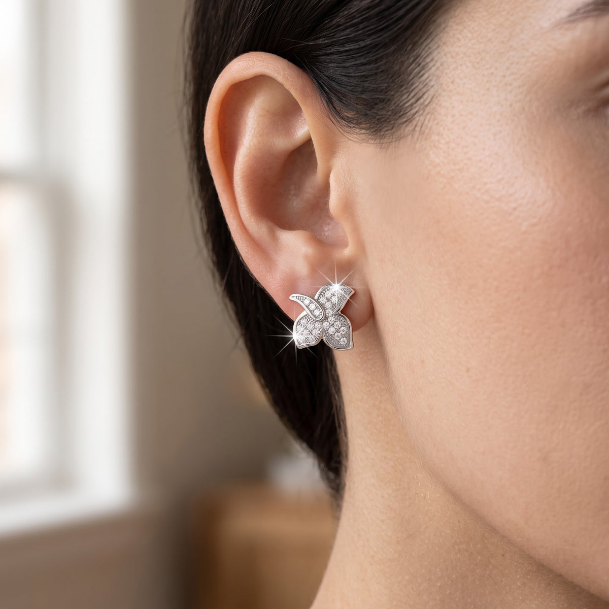White Gold over Sterling Silver Women's CZ Ivy Leaf Stud Earrings worn, lifestyle photo