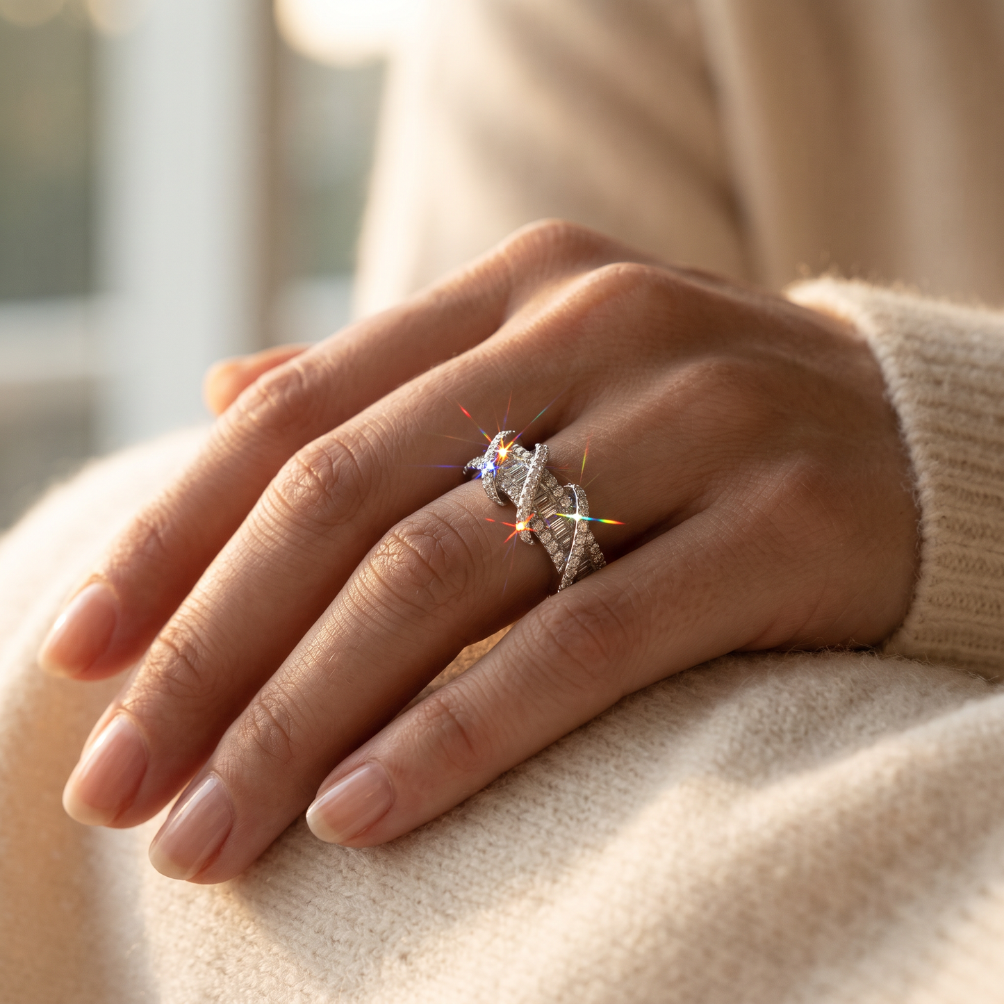Sterling Silver CZ Wrap Around Statement Ring for Women worn on a woman's hand in warm window light