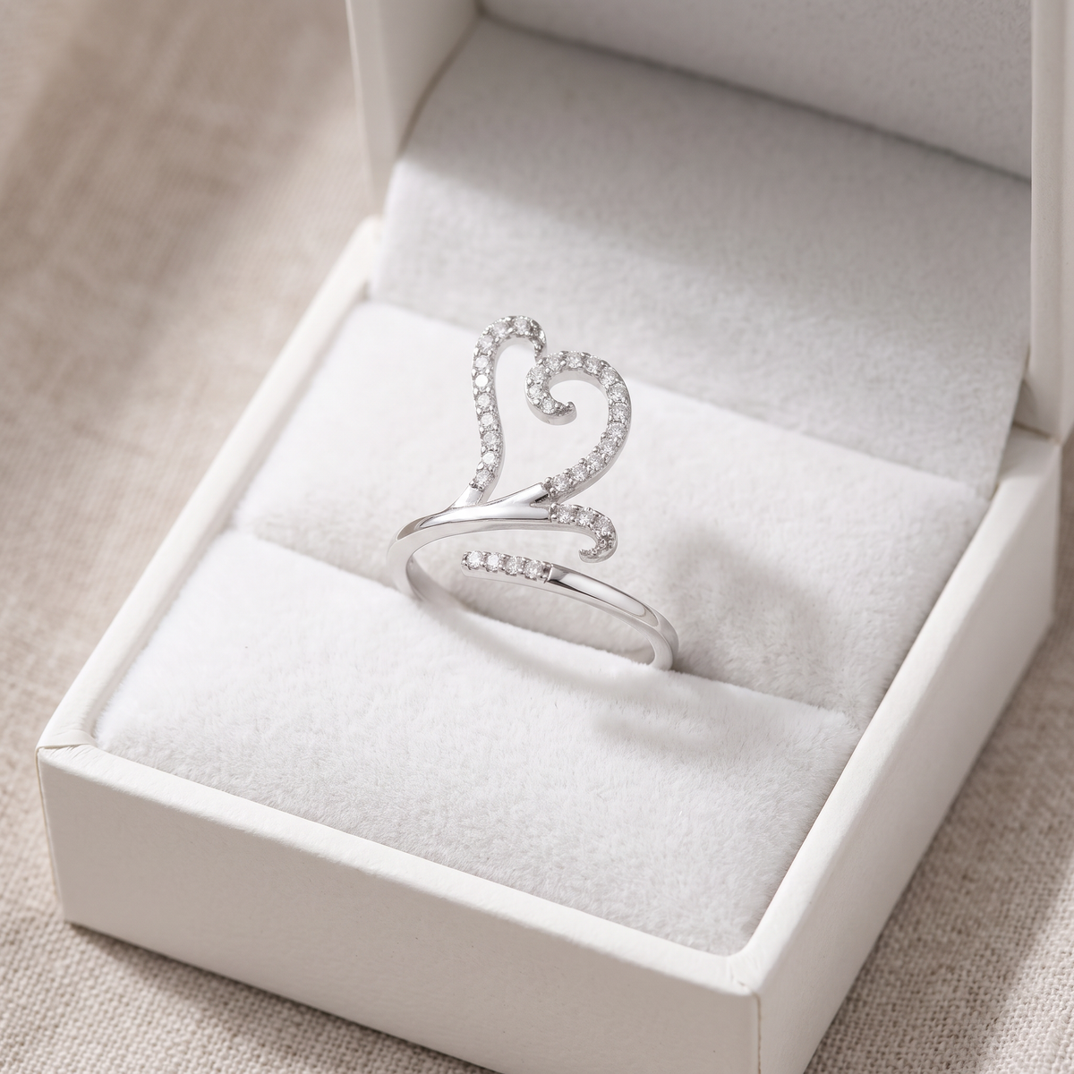 Sterling Silver Wrap Around Open Heart Statement Ring in a white gift box, ready to give